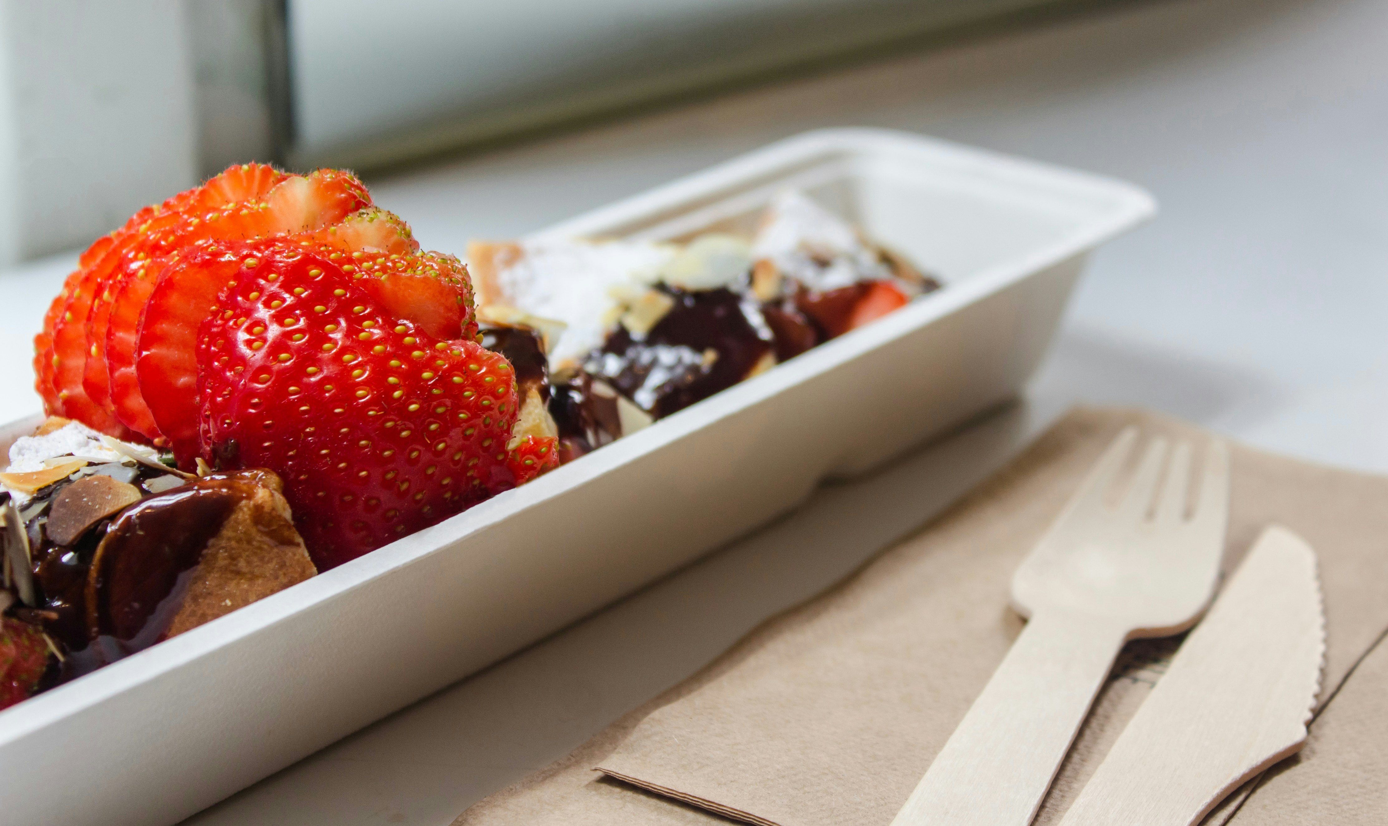 Desert in a Paper Tray with Wooden Cutleries