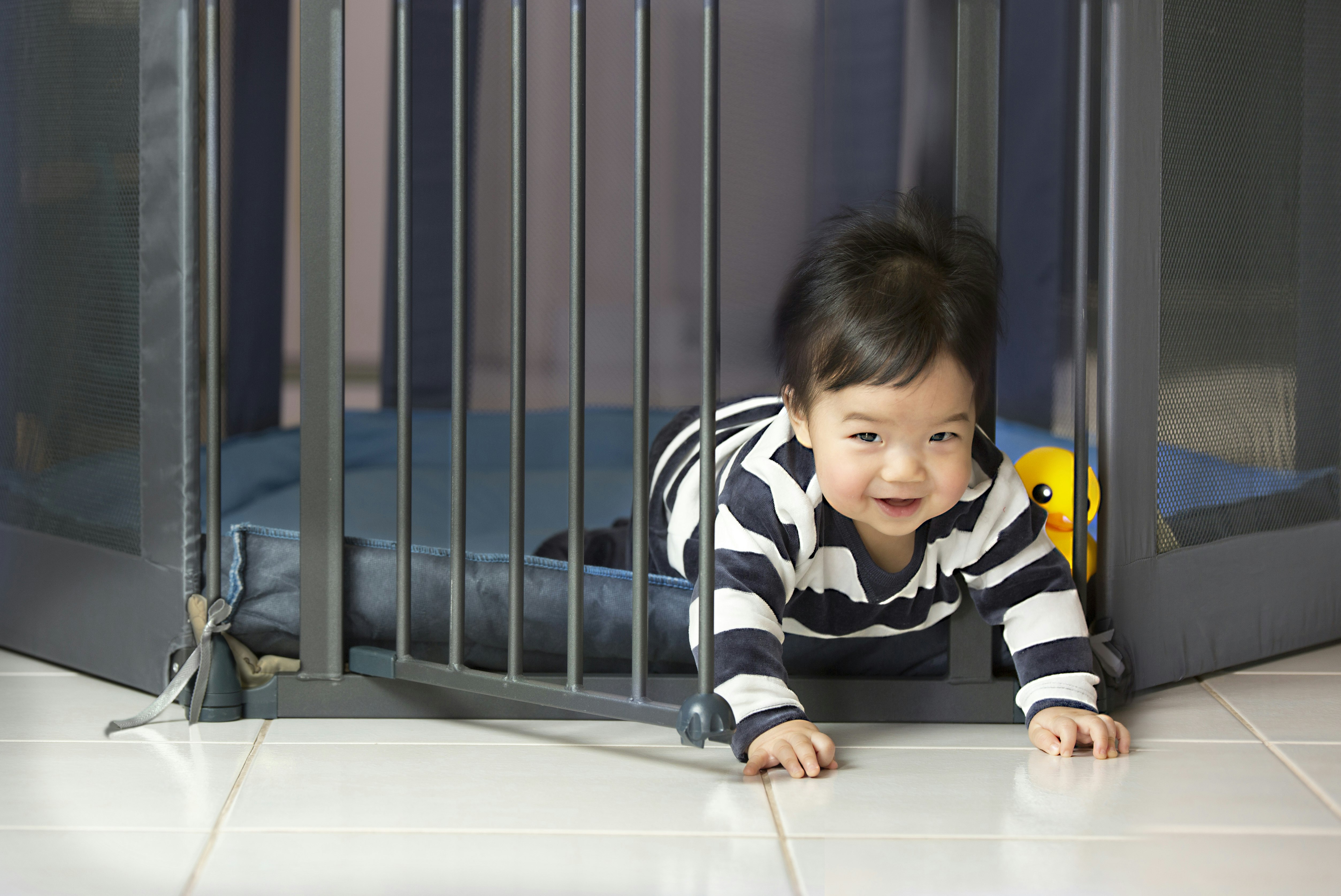Toddler Escaping from Playpen