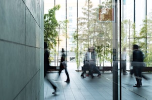 Business Persons Walking in a Urban Building
