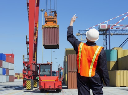 Worker Supervising Loading of Containers